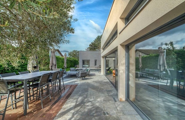 architect-designed house with pool