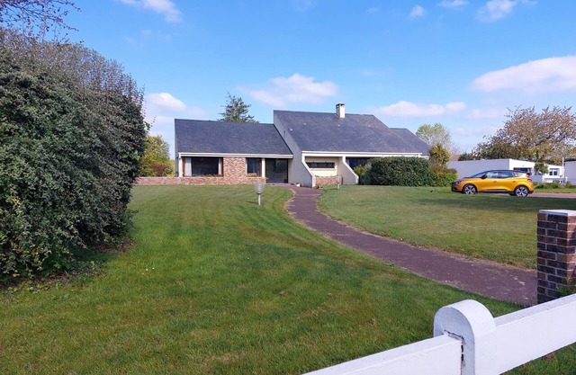 Architect's house in a very quiet environment on a large field close to the sea
