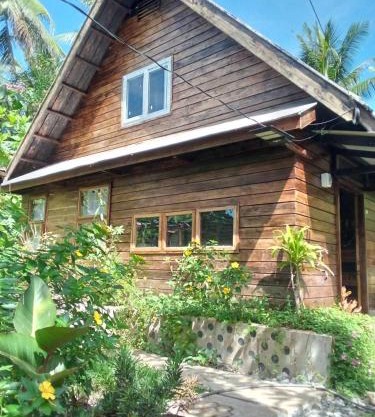 Bayawan Sunset Inn next to julsam and orange house