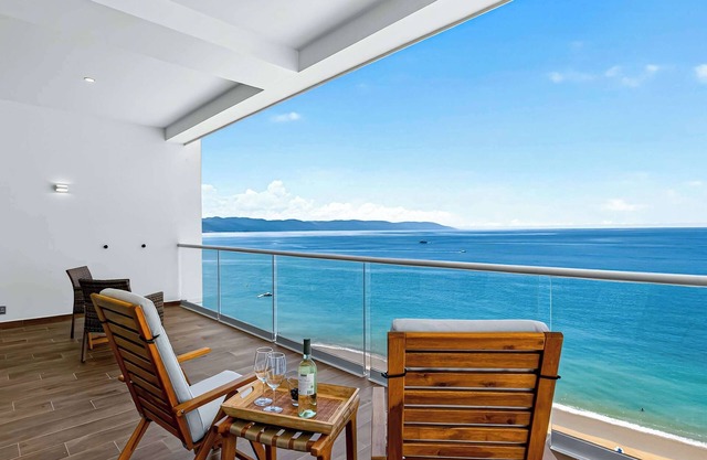 Beachfront 2BR - Pools & Scenic Balcony Views