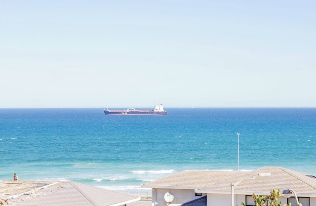 Beachfront couples paradise overlooking Robben Island and Atlantic ocean.