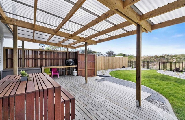 Beachfront Getaway with Modern Amenities & Comfort