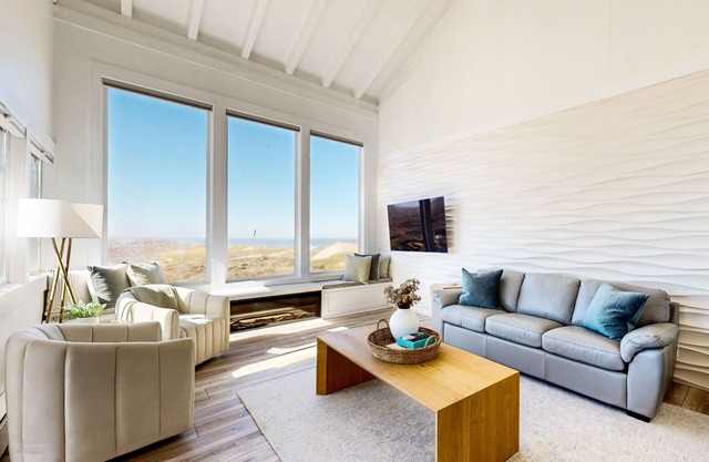 Beachfront home with heated pool, hot tub, sports courts, amazing views, & WFH