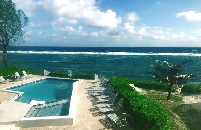 Beachfront Peace! Awesome top floor condo on Caribbean plus military discount!