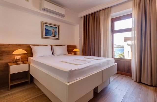 Beachfront Studio with Kitchen & Private Bathroom