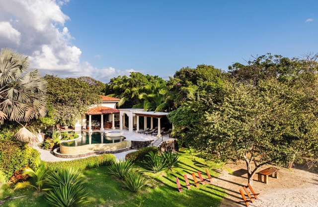 Beachfront Villa with Private Pool, Hot Tub, Sauna & Breathtaking Sunsets