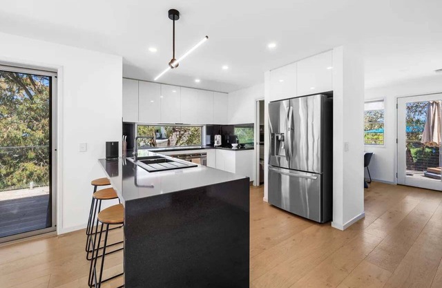 Beachside Bliss I Walk to Beach I Heated Pool