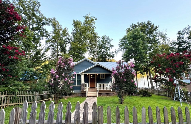 Beautiful 3 BR Home on Malone Lake - Great Views - Private Dock - Walk to Marina