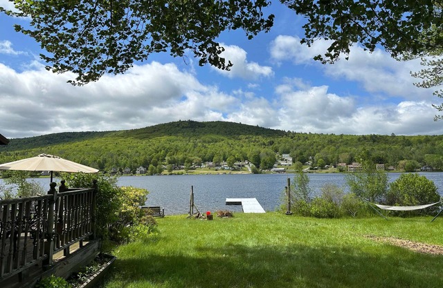 Beautiful 6 Bedroom Lakefront Home w/Own Dock and beautiful foliage views. Please note that this home does not have air conditioning. Box fans are provided and because of our proximity to the lake, it is cooler in the evenings.
