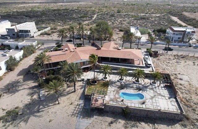 Beautiful beachfront 7 BR 6.5 BtR colonial style estate on 30,000 sqft lot