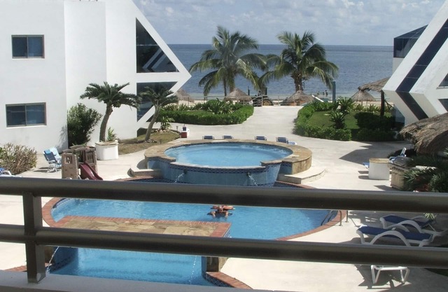 Beautiful condo on the beach with pool