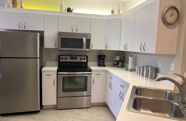 Beautiful first floor condo with view of the prestigious Gateway Golf Course.