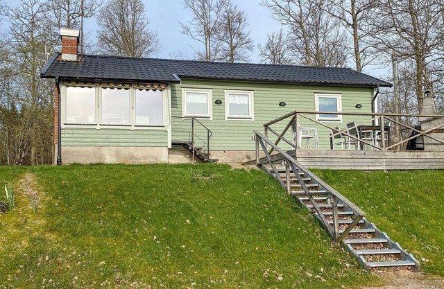 Beautiful home in Torup with lake view