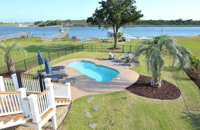 Beautiful ICW views! Private pier, pool, hot tub, fire pits, and more!