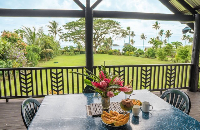 Beautiful ocean view home on 1 acre across from the beach. Prime Location