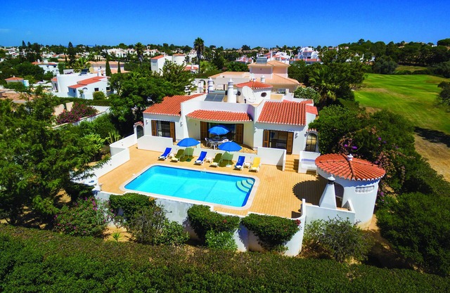 Beautiful private enclosed villa with AC & heated pool overlooking golf course