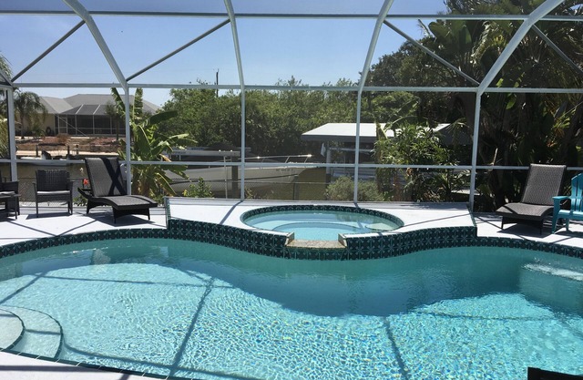 Beautiful relaxing waterfront home with pool, spa and boat dock.