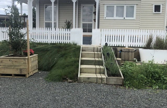 Beautiful Tiny House with communal water hole.