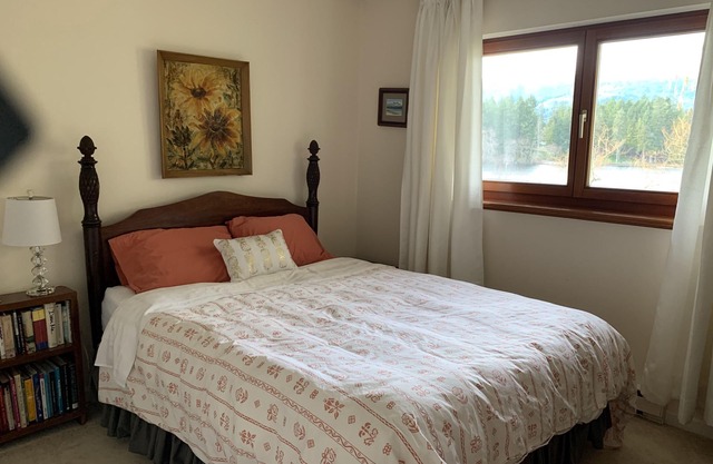 Beautiful traditional family home and garden beside a lake
