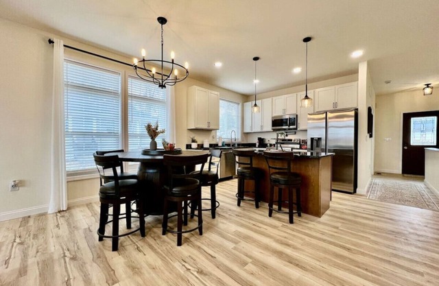 Beautiful NEW Ranch Home with a large deck & games