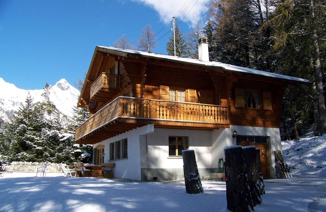 Beautiful Wooden Chalet set in private woodland and garden with stunning views.