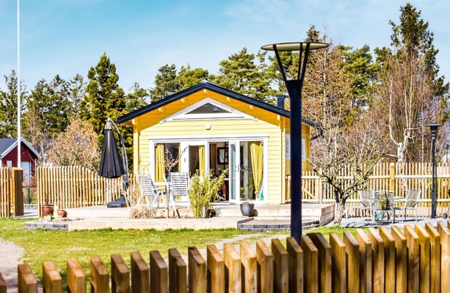 Beautiful wooden house with inviting flair and large outdoor area.