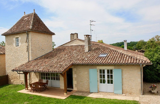 Beautifully restored pigeon tower and converted barn.
