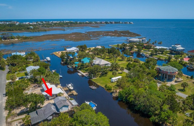 Big Canal-front house, kayaks, canoes, game room, fish right from the dock.