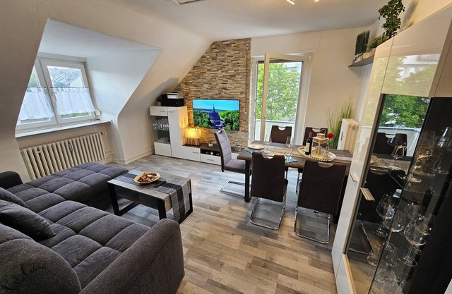 Bright and modern apartment in the attic very close to the centre and university
