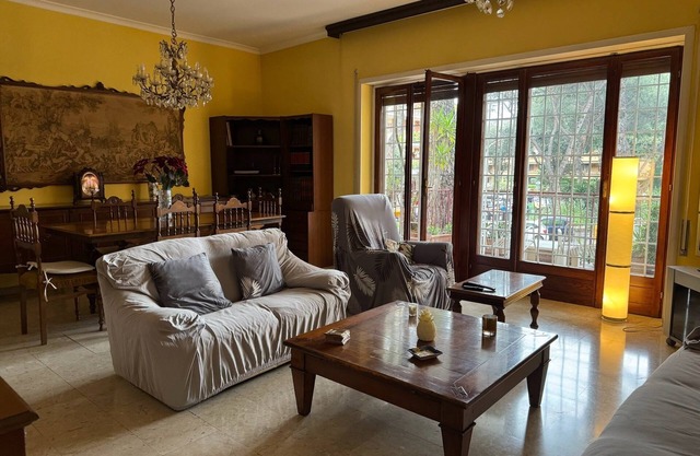 Bright apartment overlooking a characteristic square