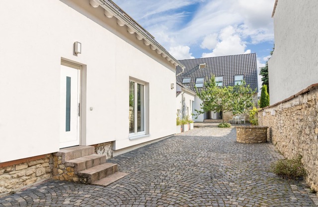 "Brunnenhaus": Stylish vacation home with Mediterranean courtyard and huge garden