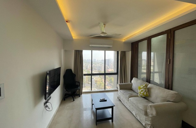 Business-Ready Apt near Jio World Centre | 1BR + Gym + Pool