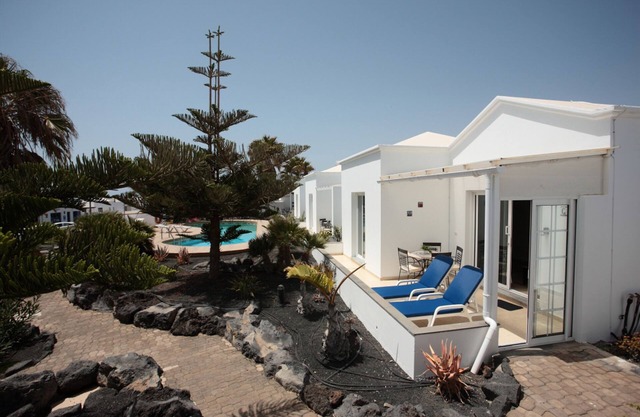 C1, in a small complex with communal heated pool 100m from the sea