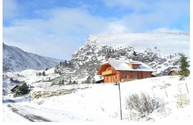 Cabin in Falkertsee with swimming pool