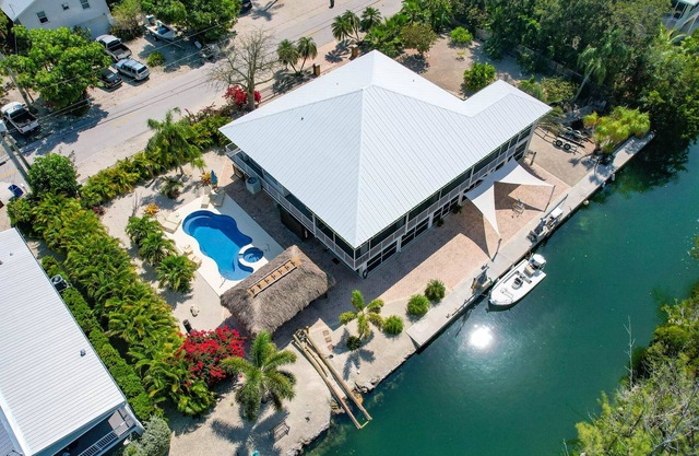 Canal front home with pool !