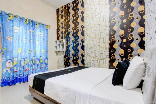 Capital O 93829 Alika Homestay Syariah