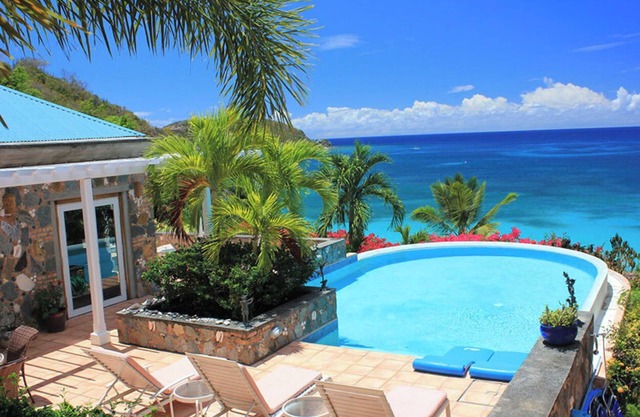 Carnival Beach House Awaits: Relax in Style with Beachfront Views, A/C, and a Private Pool!