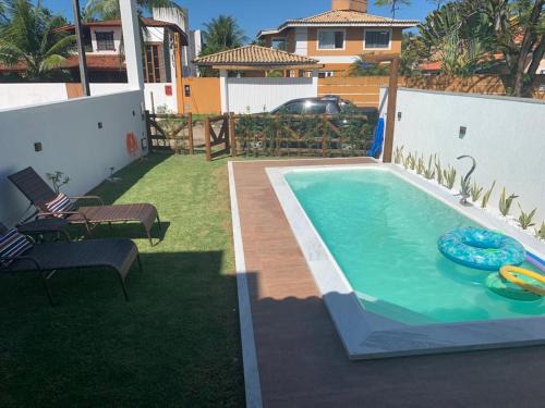 Casa 4 suítes com piscina Condomínio Lagoa Dourada Ilha de Itaparica BA