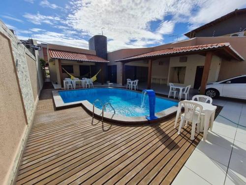 Casa agradável: piscina, churrasqueira e redário.