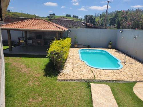 Casa com ampla área de lazer há 10 minutos do Santuário de Aparecida