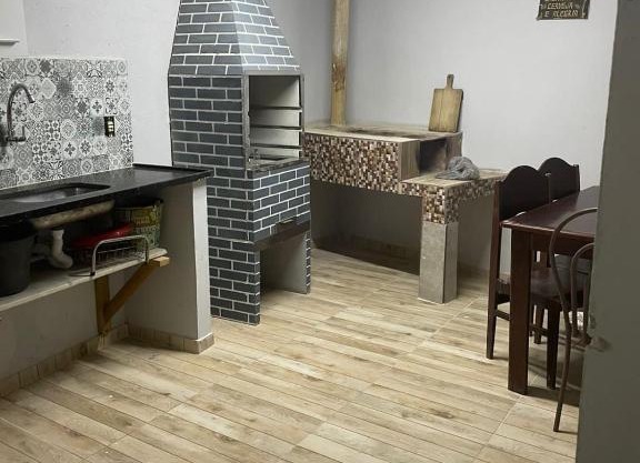 Casa com churrasqueira