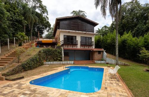 Casa com piscina, churrasqueira, Wi-Fi e garagem