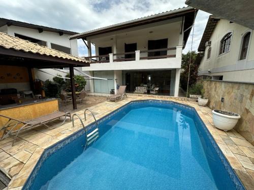 Casa condomínio 8 pessoas, piscina, churrasqueira