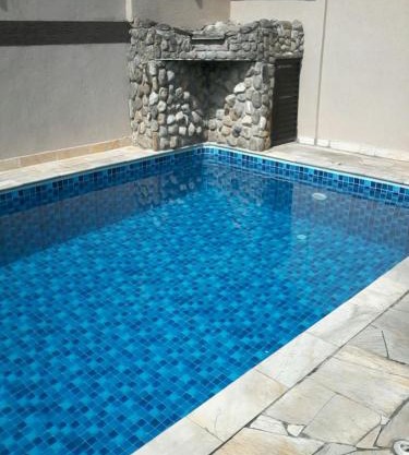 Casa familiar com Piscina Praia Grande