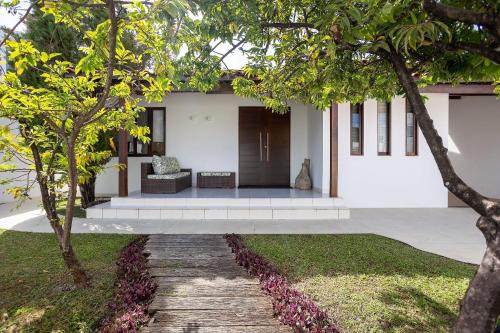 Casa Jardim - Praia do Bessa por Carpediem