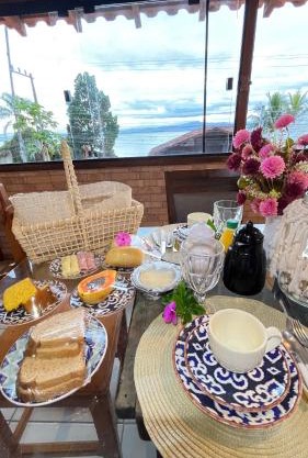 Casa Pôr do Sol com churrasqueira ar condicionado