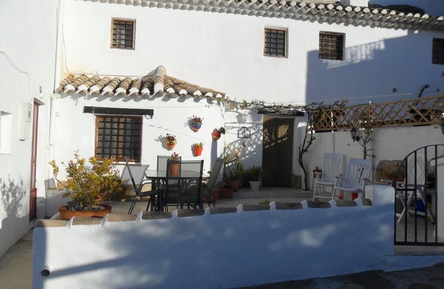 Cave House with a spectacular view of the village and across to Sagra