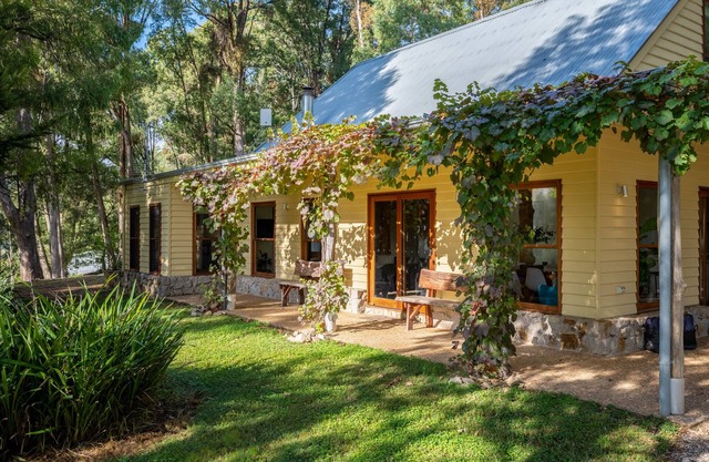 Centenary Heights - Boasting commanding views of the surrounding bushland and rolling hills of Wandiligong .