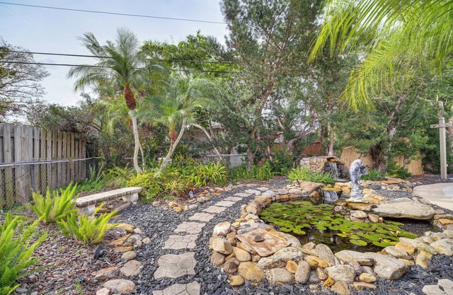 Centrally Located Merritt Island Home: Pool, Porch