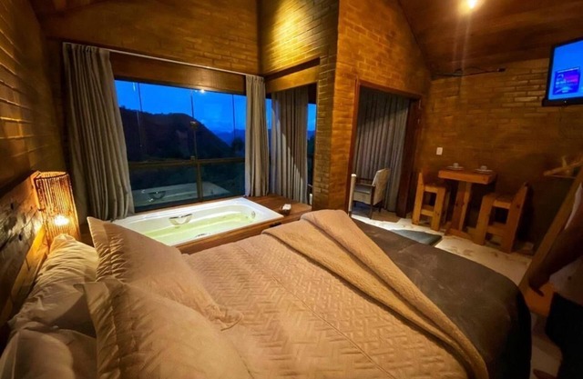 Chalé Aconchegante no Circuito Caravaggio com Hidromassagem Vista das Montanhas